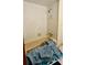 Bathroom showing a tiled tub and shower area, partially covered by a tarp at 6429 Voltaire Dr, Orlando, FL 32809
