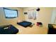 Simple bedroom featuring two air mattresses and a window covered by curtains at 6429 Voltaire Dr, Orlando, FL 32809