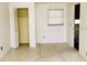 Bright bedroom offers a built-in closet and a sun-filled window at 6429 Voltaire Dr, Orlando, FL 32809