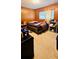 Bedroom with wood paneling, neutral carpet, and a window with blinds at 6429 Voltaire Dr, Orlando, FL 32809