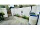 Enclosed patio area with concrete flooring and privacy wall at 6429 Voltaire Dr, Orlando, FL 32809