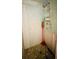 Shower with tiled walls, a showerhead, and shelves at 6429 Voltaire Dr, Orlando, FL 32809