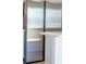 Close-up of a new stainless steel refrigerator in a modern kitchen setting at 814 Massy Ct, Kissimmee, FL 34759
