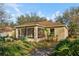This home offers lush plants and a well maintained grass at 820 Cypress Oak Cir, Deland, FL 32720
