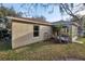 This home has a well maintained backyard with lush plants and well maintained grass at 820 Cypress Oak Cir, Deland, FL 32720