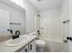 Well-lit bathroom with a vanity, sink, and shower-tub combination at 820 Cypress Oak Cir, Deland, FL 32720