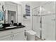 Bathroom features a walk-in shower and stylish vanity at 8515 Morehouse Dr, Orlando, FL 32836