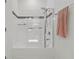 Clean and modern bathroom showcases a glass-enclosed bathtub and shower with stylish tile accents at 8515 Morehouse Dr, Orlando, FL 32836