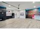 Spacious garage featuring car-themed decor and ample storage at 8515 Morehouse Dr, Orlando, FL 32836