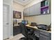 Functional home office with custom cabinetry, built in desk, task lighting, and a comfortable executive chair at 8515 Morehouse Dr, Orlando, FL 32836