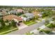 Street view of the neighborhood with lush green landscaping and well-maintained homes at 8515 Morehouse Dr, Orlando, FL 32836