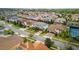 Neighborhood street view showcasing beautiful homes with mature trees and lush landscaping at 8515 Morehouse Dr, Orlando, FL 32836