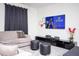 Living room with TV and a large comfy sectional at 8988 Cabot Cliffs Dr, Champions Gate, FL 33896