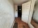 Interior view of an entrance way showing the doorway to another room at 9350 2Nd Ave, Orlando, FL 32824