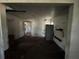 Renovation ready living room with a silver refrigerator at 9350 2Nd Ave, Orlando, FL 32824