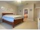 Spacious main bedroom with ensuite bathroom and large garden tub at 9526 Lake Hugh Dr, Gotha, FL 34734