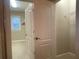 Spacious walk-in closet with custom shelving, and well-lit interior at 9526 Lake Hugh Dr, Gotha, FL 34734
