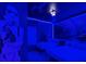 Star Wars themed bedroom features two twin beds, blue LED lighting, and Storm Trooper figure at 10437 Ebb Tide Ln, Orlando, FL 32821