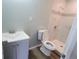 Modern bathroom features a new vanity, toilet, and a stylish tiled stand up shower at 1303 37Th Nw St, Winter Haven, FL 33881