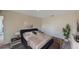 Serene bedroom with neutral decor, a plush bed, and ample space at 137 Maple W Dr, Kissimmee, FL 34759