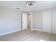 Spacious bedroom with wood floors, closet, and two doors at 1382 Wright St, Daytona Beach, FL 32117