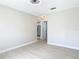 A bedroom featuring wood-look floors and an interior door to another room at 1382 Wright St, Daytona Beach, FL 32117