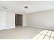 Open living room featuring neutral paint and light wood flooring at 1382 Wright St, Daytona Beach, FL 32117