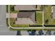 Bird's eye view of the property, highlighting the roof, yard, and neighborhood layout at 1619 Leatherback Ln, St Cloud, FL 34771