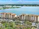 Breathtaking aerial view of the beautiful condo community on the serene lake at 16300 County Road 455 # 201, Montverde, FL 34756