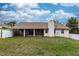 Expansive backyard with screened lanai and privacy fence at 1811 Springwood Ln, Deltona, FL 32725