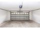 Spacious garage with automatic door opener and overhead storage at 1811 Springwood Ln, Deltona, FL 32725