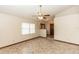 Bright living room featuring tile floors and neutral paint at 1811 Springwood Ln, Deltona, FL 32725