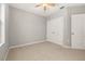 A bedroom featuring neutral walls, carpet flooring and a closet at 209 Arbor Lakes Dr, Davenport, FL 33896