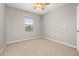 Bedroom featuring neutral walls, carpet flooring and a window at 209 Arbor Lakes Dr, Davenport, FL 33896