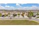 Charming townhome exterior featuring a two-car garage and well-maintained landscaping at 209 Arbor Lakes Dr, Davenport, FL 33896