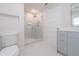 Modern bathroom featuring a glass-enclosed shower with white tile at 2721 Ingeborg Ct, Windermere, FL 34786