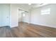 Neutral bedroom with wood floors, large closet, and lots of natural light at 2721 Ingeborg Ct, Windermere, FL 34786