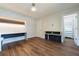 Hardwood floors highlight this bedroom featuring a desk with built-in storage and a walk-in closet at 2721 Ingeborg Ct, Windermere, FL 34786