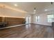 Expansive main bedroom features modern built-ins, wood floors, recessed lighting, and natural light at 2721 Ingeborg Ct, Windermere, FL 34786