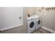 Laundry room with a washer and dryer set at 4898 Lyric Dr, Mascotte, FL 34753