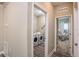 View of the laundry room next to a flex space with a view of the interior of the home at 4898 Lyric Dr, Mascotte, FL 34753