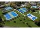 Aerial view of the community tennis, pickleball, and basketball courts at 4978 Fawn Ridge Pl, Sanford, FL 32771