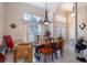 Formal dining room with a unique wood table at 4978 Fawn Ridge Pl, Sanford, FL 32771