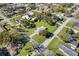 Overhead view of a home showcasing the large lot, mature trees and the surrounding neighborhood at 522 Wisconsin Ave, St Cloud, FL 34769