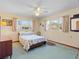 Bedroom with hardwood floors, a ceiling fan, and lots of light at 522 Wisconsin Ave, St Cloud, FL 34769