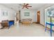 Cozy living room with light-colored walls, neutral flooring, and comfortable seating at 522 Wisconsin Ave, St Cloud, FL 34769