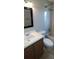 A bathroom featuring a standard shower and bathtub combination at 5843 Willow Leaf Ct, Orlando, FL 32807