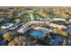 An aerial view of a community clubhouse, pool and golf course at 6229 Indian Meadow St, Orlando, FL 32819