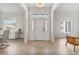 Bright entryway with wood floors and a chandelier at 6229 Indian Meadow St, Orlando, FL 32819