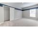 Spacious bedroom features a closet and large window at 64 Citrine Loop, Kissimmee, FL 34758